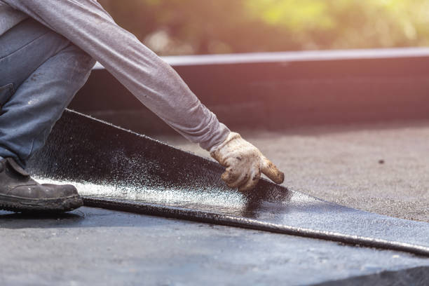 Professional Waterproofing technician working in Folsom, NJ